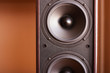 Powerful audio system. Closeup view of black bass power speaker