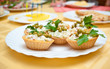 Tarts with a salad on plate