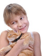 little girl hugging with her kitten
