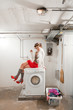 housewife bored in the laundry