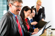 Photo: Business - businesspeople have team meeting Business - businesspeople have team meeting
