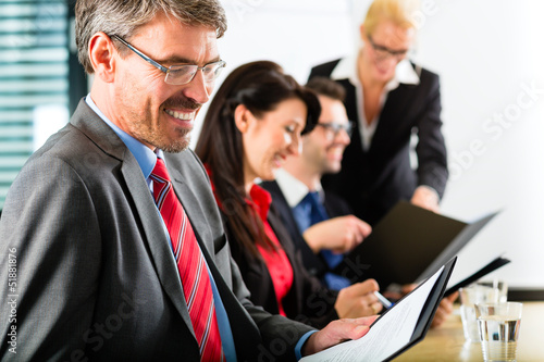Photo: Business - businesspeople have team meeting Business - businesspeople have team meeting