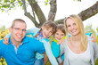 portrait of cheerfull family in nature