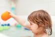  kid bathes in bath