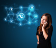 Pretty girl making phone call with social network icons