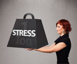 Young woman holding one ton of stress weight