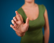 Woman pressing imaginary button