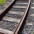 Railway rail road track disappearing around a curve