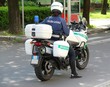 Donna polizia locale in moto