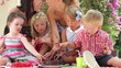 Video: Parents And Children Enjoying Chocolate Cake At Party Parents And Children Enjoying Chocolate Cake At Party