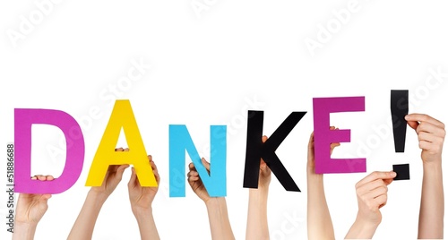 Photo: people holding word DANKE! people holding word DANKE!