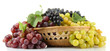 assortment of ripe sweet grapes in basket, isolated on white.