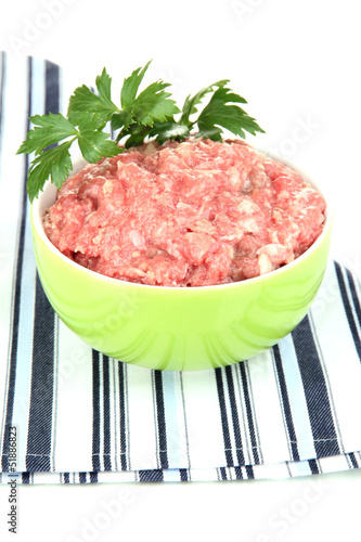 Photo: Bowl of raw ground meat isolated on white Bowl of raw ground meat isolated on white