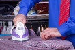 Businessman Ironing Clothes
