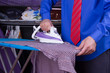 Businessman Ironing Clothes