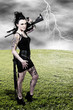 Foto: Woman with Assault Rifle Woman with Assault Rifle