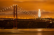 25 de Abril bridge over Tagus river and big Christ in Lisbon