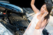 Woman with damaged car