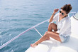 Woman sailing in a yacht