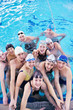 Foto: happy children group at swimming pool happy children group at swimming pool
