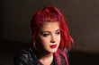 Photo: Pensive Woman in Pink Hair Pensive Woman in Pink Hair