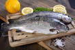 Two trout, pepper and lemon.