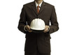 Businessman with construction helmet
