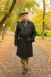 Foto: man walking in autumn man walking in autumn
