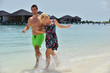 Photo: happy young couple at summer vacation have fun and relax happy young couple at summer vacation have fun and relax