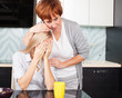 Mother soothes sad daughter