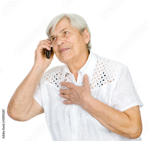 Photo: Portrait of a happy mature woman talking on cell phone. isolated Portrait of a happy mature woman talking on cell phone. isolated
