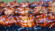 Chicken rotating on a skewer.