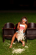 beautiful girl watch the film in outdoor summer cinema