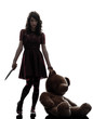 strange young woman killer holding  bloody knife silhouette