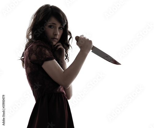 Photo: strange young woman killer holding bloody knife silhouette strange young woman killer holding bloody knife silhouette
