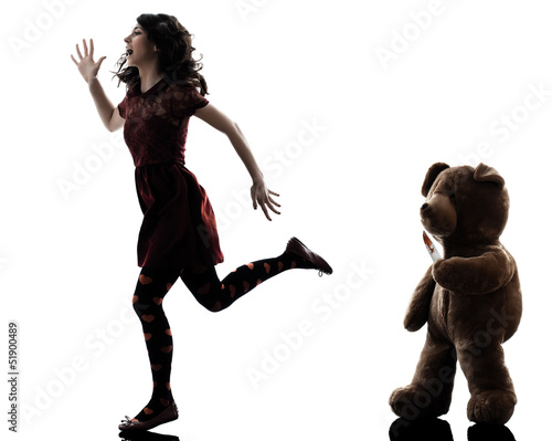 Photo: strange young woman and killer teddy bear silhouette strange young woman and killer teddy bear silhouette