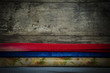 old wooden background with colored paper