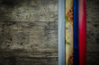 old wooden background with colored paper