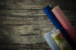 old wooden background with colored paper