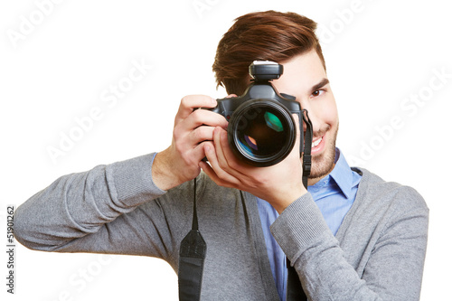 Photo: Lachender Hochzeitsfotograf mit Kamera Lachender Hochzeitsfotograf mit Kamera