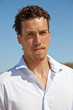 Handsome fit young man on the beach