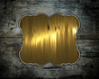 Old wood texture with gold nameplate