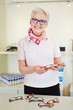 Optician giving consultation for glasses