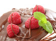 raspberry cover with milk chocolate isolated on white