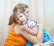 mother calms crying child