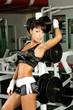 Pretty athletic girl in gym
