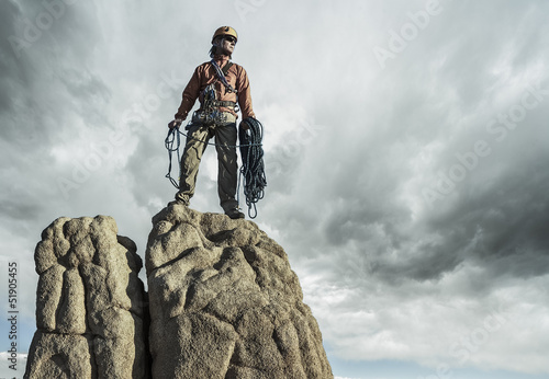 Photo: Climber on the summit. Climber on the summit.