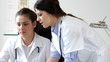 Medic consultation in doctor office - tracking shot