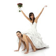 Photo: Girl bride in a white dress goes on naked man Girl bride in a white dress goes on naked man