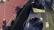 Window Cleaners Descend from the Roof of the Building